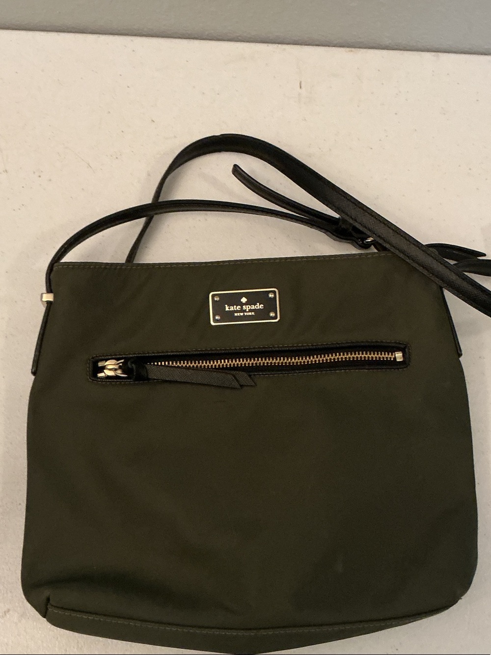 kate spade Wilson Road Dessi olive nylon crossbody with gold-tone plaque